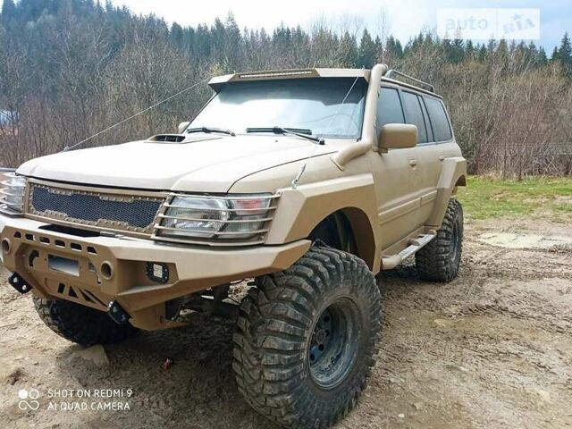 Коричневий Ніссан Патрол, об'ємом двигуна 2.8 л та пробігом 170 тис. км за 18500 $, фото 2 на Automoto.ua