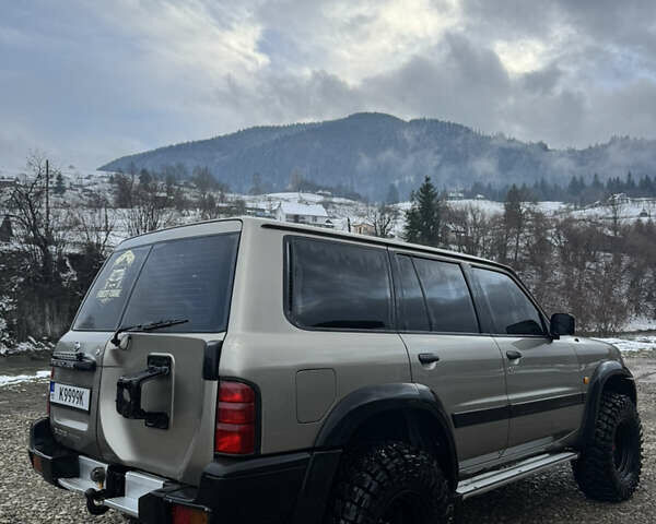 Коричневий Ніссан Патрол, об'ємом двигуна 2.95 л та пробігом 355 тис. км за 17999 $, фото 5 на Automoto.ua
