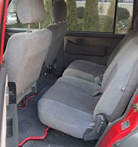 Красный Ниссан Патрол, объемом двигателя 2.8 л и пробегом 413 тыс. км за 12890 $, фото 13 на Automoto.ua