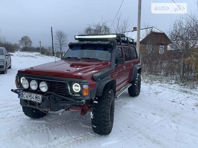 Червоний Ніссан Патрол, об'ємом двигуна 4.2 л та пробігом 300 тис. км за 14700 $, фото 9 на Automoto.ua