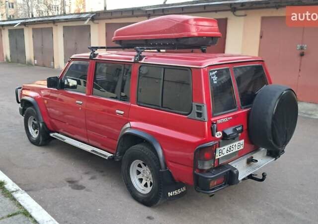 Красный Ниссан Патрол, объемом двигателя 2.8 л и пробегом 413 тыс. км за 12890 $, фото 27 на Automoto.ua