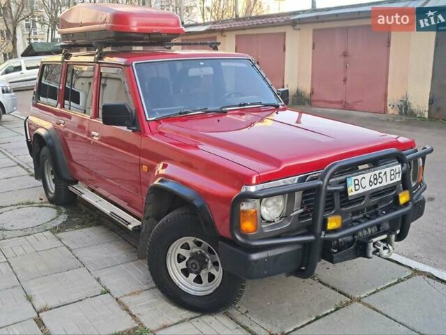 Красный Ниссан Патрол, объемом двигателя 2.8 л и пробегом 413 тыс. км за 12890 $, фото 11 на Automoto.ua