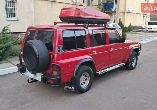 Красный Ниссан Патрол, объемом двигателя 2.8 л и пробегом 413 тыс. км за 12890 $, фото 26 на Automoto.ua