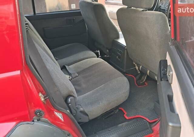 Красный Ниссан Патрол, объемом двигателя 2.8 л и пробегом 413 тыс. км за 12890 $, фото 15 на Automoto.ua