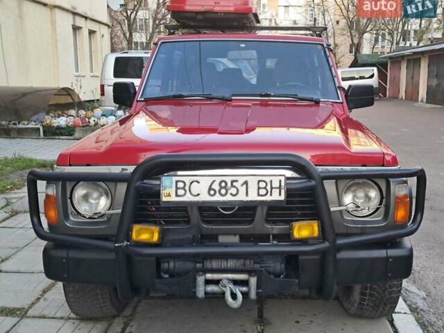 Красный Ниссан Патрол, объемом двигателя 2.8 л и пробегом 413 тыс. км за 12890 $, фото 23 на Automoto.ua