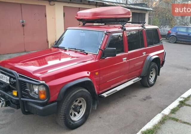 Красный Ниссан Патрол, объемом двигателя 2.8 л и пробегом 413 тыс. км за 12890 $, фото 24 на Automoto.ua