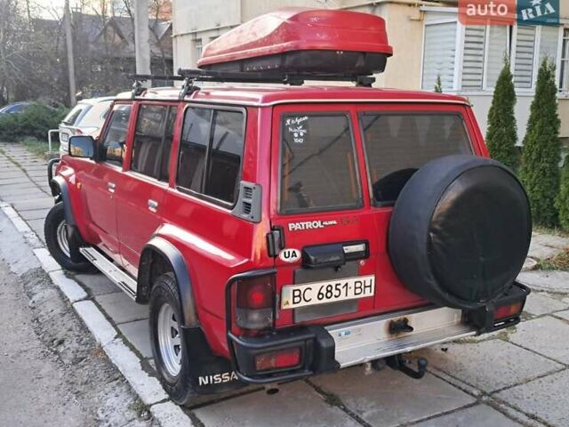 Красный Ниссан Патрол, объемом двигателя 2.8 л и пробегом 413 тыс. км за 12890 $, фото 4 на Automoto.ua