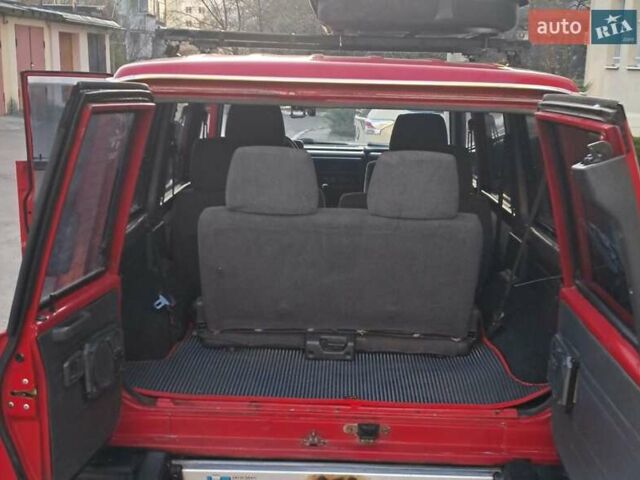 Красный Ниссан Патрол, объемом двигателя 2.8 л и пробегом 413 тыс. км за 12890 $, фото 14 на Automoto.ua