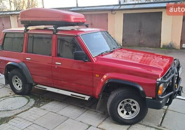 Красный Ниссан Патрол, объемом двигателя 2.8 л и пробегом 413 тыс. км за 12890 $, фото 10 на Automoto.ua