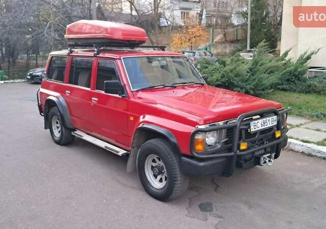 Красный Ниссан Патрол, объемом двигателя 2.8 л и пробегом 413 тыс. км за 12890 $, фото 25 на Automoto.ua