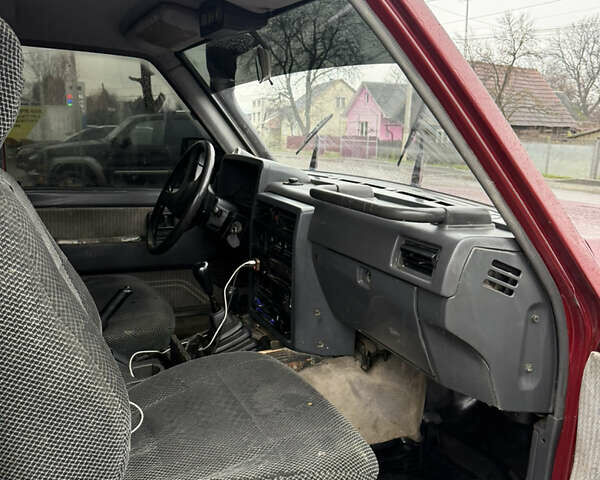 Красный Ниссан Патрол, объемом двигателя 2.8 л и пробегом 250 тыс. км за 7500 $, фото 7 на Automoto.ua