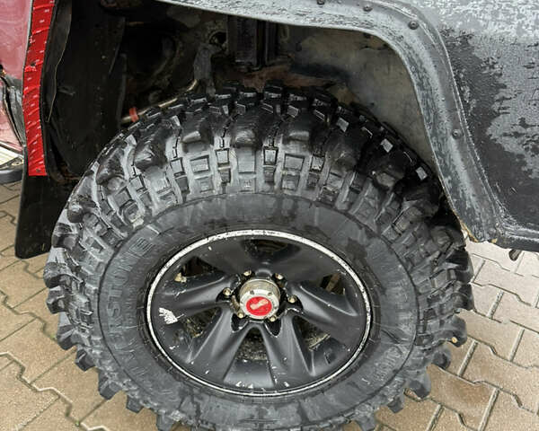 Красный Ниссан Патрол, объемом двигателя 2.8 л и пробегом 250 тыс. км за 7500 $, фото 9 на Automoto.ua