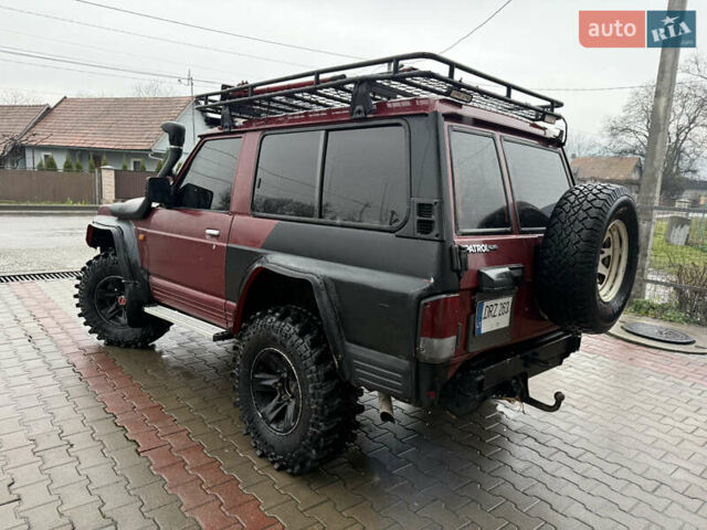 Красный Ниссан Патрол, объемом двигателя 2.8 л и пробегом 250 тыс. км за 7500 $, фото 5 на Automoto.ua