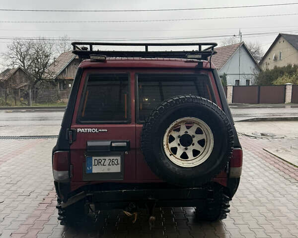Красный Ниссан Патрол, объемом двигателя 2.8 л и пробегом 250 тыс. км за 7500 $, фото 6 на Automoto.ua