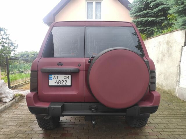 Красный Ниссан Патрол, объемом двигателя 3 л и пробегом 250 тыс. км за 35000 $, фото 5 на Automoto.ua