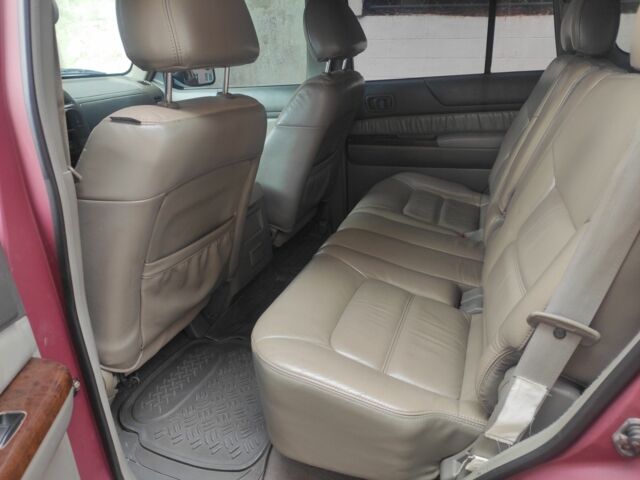 Красный Ниссан Патрол, объемом двигателя 3 л и пробегом 250 тыс. км за 35000 $, фото 8 на Automoto.ua