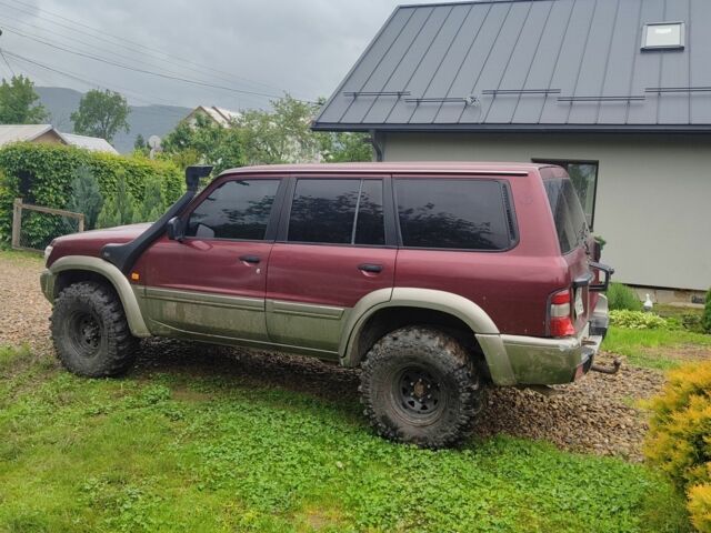 Червоний Ніссан Патрол, об'ємом двигуна 0 л та пробігом 290 тис. км за 9300 $, фото 4 на Automoto.ua