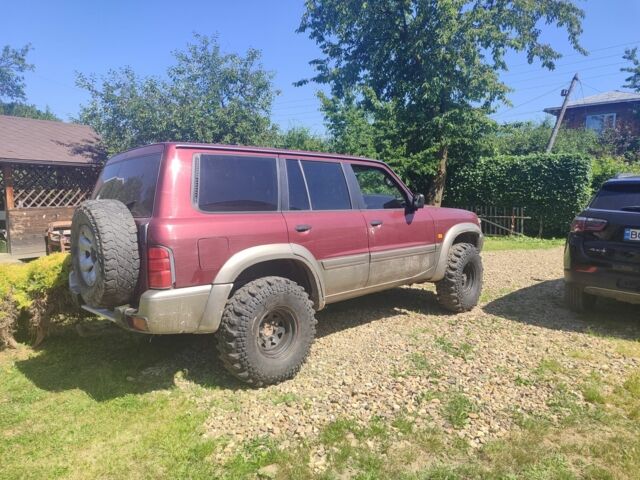 Червоний Ніссан Патрол, об'ємом двигуна 0 л та пробігом 290 тис. км за 9300 $, фото 3 на Automoto.ua