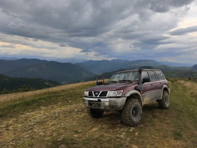 Червоний Ніссан Патрол, об'ємом двигуна 0 л та пробігом 290 тис. км за 9300 $, фото 5 на Automoto.ua
