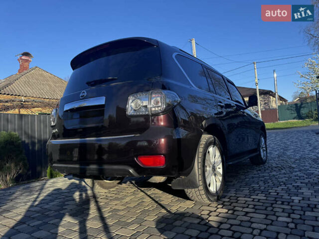 Красный Ниссан Патрол, объемом двигателя 5.55 л и пробегом 180 тыс. км за 20000 $, фото 16 на Automoto.ua