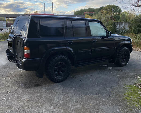 Ниссан Патрол, объемом двигателя 4.5 л и пробегом 285 тыс. км за 6650 $, фото 5 на Automoto.ua