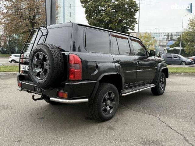 Ниссан Патрол, объемом двигателя 3 л и пробегом 359 тыс. км за 17999 $, фото 6 на Automoto.ua