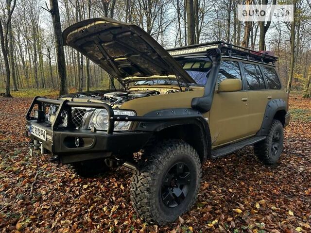 Ніссан Патрол, об'ємом двигуна 3 л та пробігом 340 тис. км за 29900 $, фото 14 на Automoto.ua