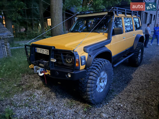 Жовтий Ніссан Патрол, об'ємом двигуна 4.2 л та пробігом 150 тис. км за 30000 $, фото 2 на Automoto.ua
