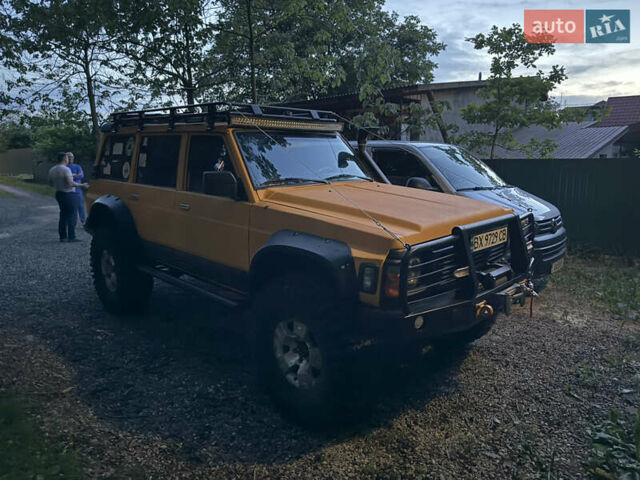 Жовтий Ніссан Патрол, об'ємом двигуна 4.2 л та пробігом 150 тис. км за 30000 $, фото 1 на Automoto.ua