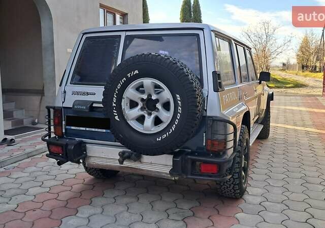 Серый Ниссан Патрол, объемом двигателя 2.8 л и пробегом 300 тыс. км за 9997 $, фото 26 на Automoto.ua