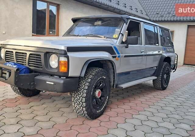 Серый Ниссан Патрол, объемом двигателя 2.8 л и пробегом 300 тыс. км за 9997 $, фото 14 на Automoto.ua