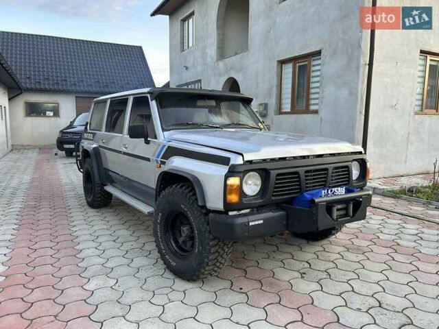 Серый Ниссан Патрол, объемом двигателя 2.8 л и пробегом 234 тыс. км за 9300 $, фото 37 на Automoto.ua