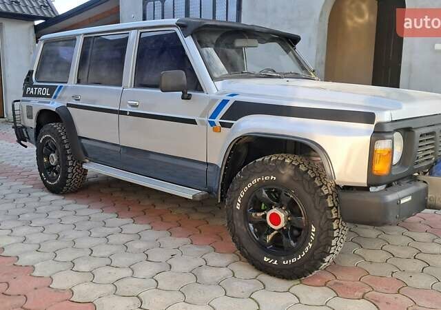 Серый Ниссан Патрол, объемом двигателя 2.8 л и пробегом 300 тыс. км за 9997 $, фото 11 на Automoto.ua