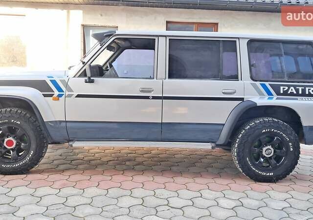 Серый Ниссан Патрол, объемом двигателя 2.8 л и пробегом 300 тыс. км за 9997 $, фото 20 на Automoto.ua