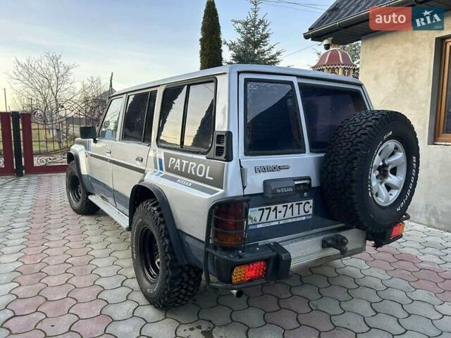 Серый Ниссан Патрол, объемом двигателя 2.8 л и пробегом 234 тыс. км за 9300 $, фото 34 на Automoto.ua