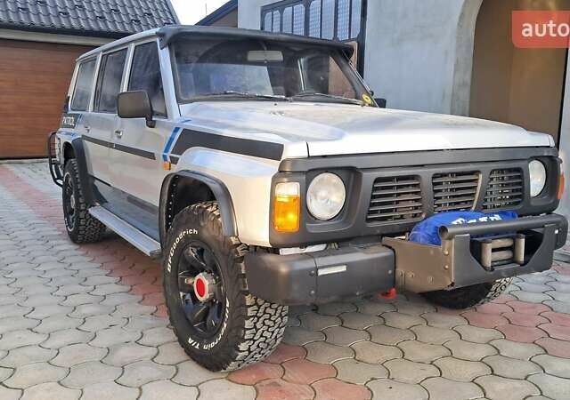 Серый Ниссан Патрол, объемом двигателя 2.8 л и пробегом 300 тыс. км за 9997 $, фото 12 на Automoto.ua