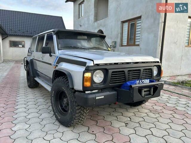 Серый Ниссан Патрол, объемом двигателя 2.8 л и пробегом 234 тыс. км за 9300 $, фото 5 на Automoto.ua