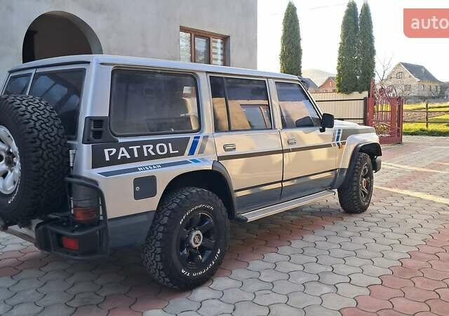 Серый Ниссан Патрол, объемом двигателя 2.8 л и пробегом 300 тыс. км за 9997 $, фото 28 на Automoto.ua