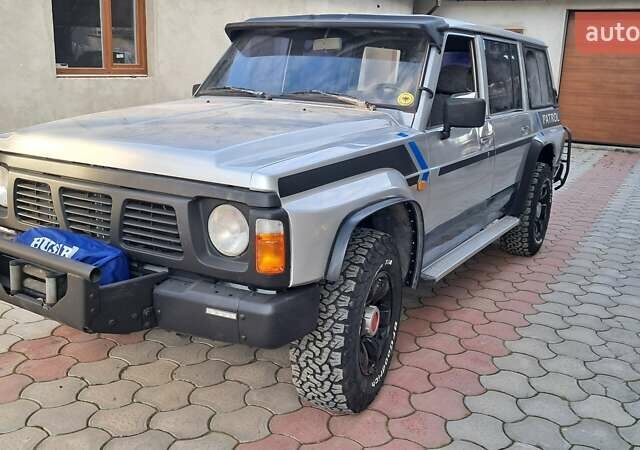 Серый Ниссан Патрол, объемом двигателя 2.8 л и пробегом 300 тыс. км за 9997 $, фото 40 на Automoto.ua