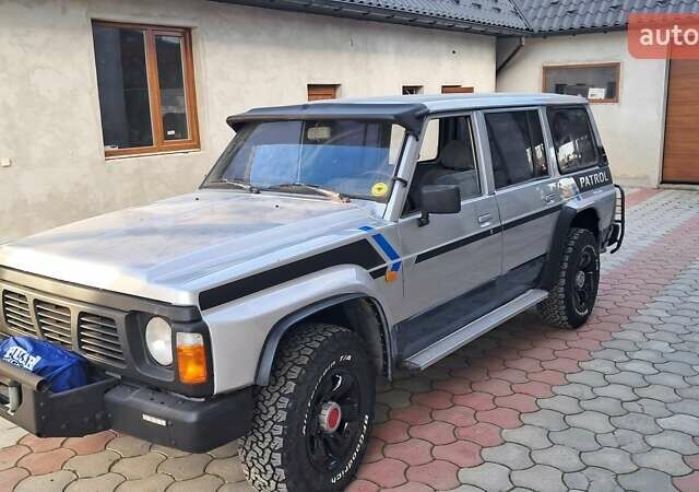 Серый Ниссан Патрол, объемом двигателя 2.8 л и пробегом 300 тыс. км за 9997 $, фото 16 на Automoto.ua