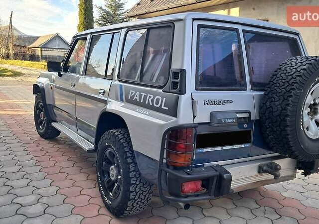 Серый Ниссан Патрол, объемом двигателя 2.8 л и пробегом 300 тыс. км за 9997 $, фото 22 на Automoto.ua