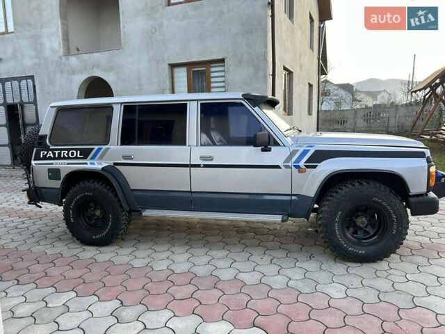Серый Ниссан Патрол, объемом двигателя 2.8 л и пробегом 234 тыс. км за 9300 $, фото 27 на Automoto.ua