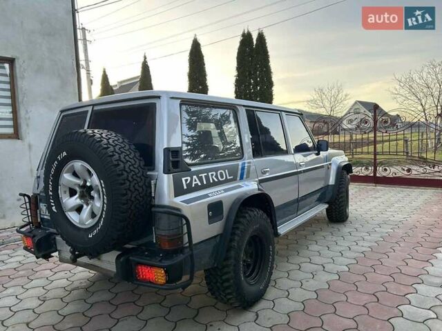 Серый Ниссан Патрол, объемом двигателя 2.8 л и пробегом 234 тыс. км за 9300 $, фото 44 на Automoto.ua