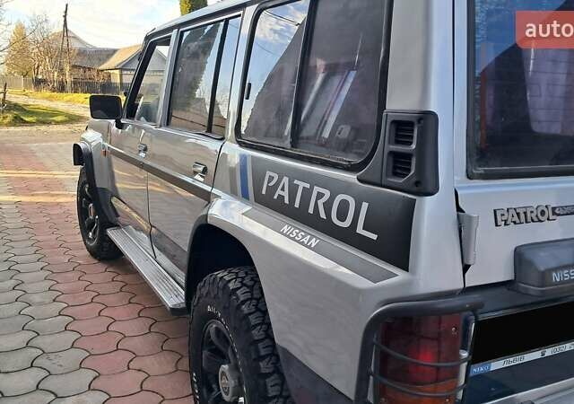 Серый Ниссан Патрол, объемом двигателя 2.8 л и пробегом 300 тыс. км за 9997 $, фото 23 на Automoto.ua