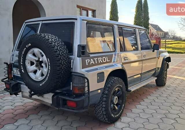 Серый Ниссан Патрол, объемом двигателя 2.8 л и пробегом 300 тыс. км за 9997 $, фото 27 на Automoto.ua