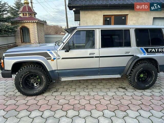 Серый Ниссан Патрол, объемом двигателя 2.8 л и пробегом 234 тыс. км за 9300 $, фото 1 на Automoto.ua