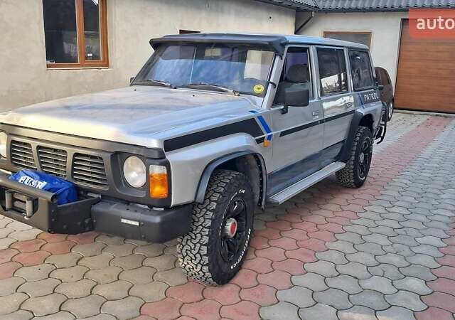 Серый Ниссан Патрол, объемом двигателя 2.8 л и пробегом 300 тыс. км за 9997 $, фото 3 на Automoto.ua