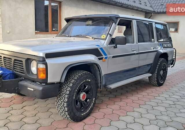 Серый Ниссан Патрол, объемом двигателя 2.8 л и пробегом 300 тыс. км за 9997 $, фото 41 на Automoto.ua