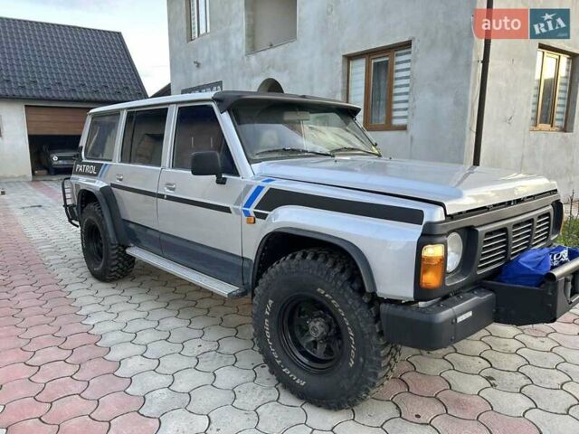 Серый Ниссан Патрол, объемом двигателя 2.8 л и пробегом 234 тыс. км за 9300 $, фото 10 на Automoto.ua
