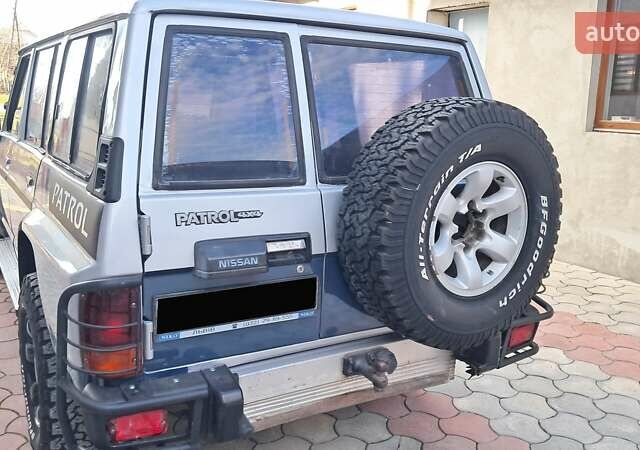 Серый Ниссан Патрол, объемом двигателя 2.8 л и пробегом 300 тыс. км за 9997 $, фото 24 на Automoto.ua